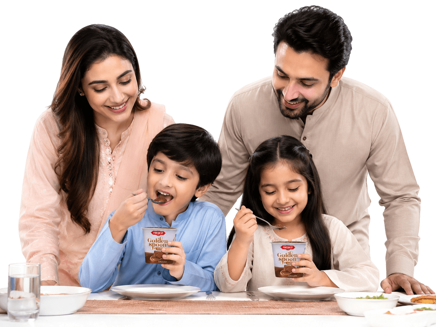 Pakistani family enjoying Golden Spoon pudding together